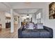 Inviting living room with modern flooring that is open to a gourmet kitchen and dining area at 2004 Hammond Dr, Mount Pleasant, SC 29466