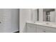 Modern bathroom featuring dual sinks, white cabinets, and quartz countertop at 211 Terrace View Dr, Summerville, SC 29486