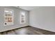 Bright bedroom features two windows with views of the neighborhood at 211 Terrace View Dr, Summerville, SC 29486