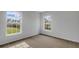 Bedroom with carpet flooring and natural light from two windows at 211 Terrace View Dr, Summerville, SC 29486