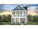 Charming two-story home featuring a double porch, white pillars, and blue siding at 211 Terrace View Dr, Summerville, SC 29486