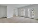 Spacious bedroom with carpeted floors, a walk-in closet, and a door to the outside at 211 Terrace View Dr, Summerville, SC 29486
