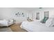 Comfortable bedroom with a cozy chair, serene decor, and ample natural light at 213 Terrace View Dr, Summerville, SC 29486