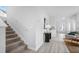 Welcoming hallway with stairs leading to the upper level, flowing seamlessly into the living area at 213 Terrace View Dr, Summerville, SC 29486