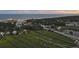 Scenic aerial of coastal homes near the beach, divided by marshy waterways at 217 E Huron Ave, Folly Beach, SC 29439
