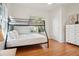 This bedroom features a bunk bed, closet, and dresser at 217 E Huron Ave, Folly Beach, SC 29439