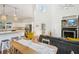 Inviting living space featuring an open floor plan, seamlessly connecting the kitchen, dining area, and cozy sitting space at 217 E Huron Ave, Folly Beach, SC 29439