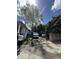 Driveway with a truck parked and greenery, providing a glimpse of a vibrant outdoor space at 227 & 229 Fishburne St, Charleston, SC 29403