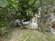 Lush backyard with shade trees creating a serene and inviting outdoor space at 227/229/3 Fishburne/Woodall St, Charleston, SC 29403