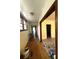 Hallway view with wood floors, baseboards, and passage into another room during renovation at 227/229/3 Fishburne/Woodall St, Charleston, SC 29403
