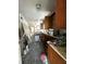 Kitchen undergoing renovation with wood cabinets and laminate countertops at 227/229/3 Fishburne/Woodall St, Charleston, SC 29403