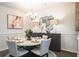 Elegant dining room with stylish furniture, decorative lighting, and modern wall art at 261 Camellia Bloom Dr, Moncks Corner, SC 29461