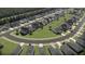 Aerial view of the new home construction community, with neatly arranged houses and landscaping at 265 Camellia Bloom Dr, Moncks Corner, SC 29461
