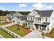 Beautiful two-story home with manicured landscaping, showing the 