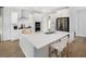Beautiful kitchen featuring white cabinets, a large center island, and stainless steel appliances at 265 Camellia Bloom Dr, Moncks Corner, SC 29461