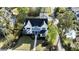Beautiful house surrounded by trees, showing a well-kept lawn and a charming neighborhood at 2805 Stay Sail Way, Mount Pleasant, SC 29466
