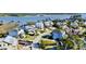 Waterfront community showcasing picturesque homes with lush landscaping near the water at 2805 Stay Sail Way, Mount Pleasant, SC 29466