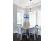 Breakfast nook features a round table, bench seating, windows and a pendant light at 2805 Stay Sail Way, Mount Pleasant, SC 29466