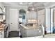 Bright kitchen features stainless steel appliances, marble countertops, island with drawers and pendant lighting at 2805 Stay Sail Way, Mount Pleasant, SC 29466