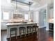 Bright kitchen features stainless steel appliances, marble countertops, island with seating and pendant lighting at 2805 Stay Sail Way, Mount Pleasant, SC 29466