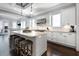 Bright kitchen features stainless steel appliances, marble countertops, island with seating and pendant lighting at 2805 Stay Sail Way, Mount Pleasant, SC 29466