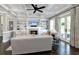 Comfortable living room featuring built-in bookshelves, fireplace, and a modern ceiling fan at 2805 Stay Sail Way, Mount Pleasant, SC 29466