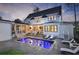 Beautiful backyard oasis featuring a sparkling pool and outdoor lounge area at 2805 Stay Sail Way, Mount Pleasant, SC 29466