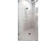Modern bathroom shower with marble tiling and glass enclosure at 2805 Stay Sail Way, Mount Pleasant, SC 29466
