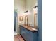 Bathroom boasting a wood countertop with dual sinks, modern fixtures, and a decorative shower with tiled walls at 2885 Plow Ground Rd, Johns Island, SC 29455