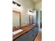 Bathroom featuring wood countertops with dual sinks, modern lighting, and ample storage cabinets, offering a stylish space at 2885 Plow Ground Rd, Johns Island, SC 29455