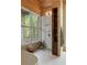 Bathroom features a soaking tub, walk-in shower with a large window at 2885 Plow Ground Rd, Johns Island, SC 29455