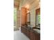 Bathroom features a double vanity, two mirrors, and a large window at 2885 Plow Ground Rd, Johns Island, SC 29455