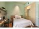 The bright bedroom features an integrated wardrobe and desk area at 2885 Plow Ground Rd, Johns Island, SC 29455