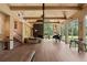 Spacious great room featuring wood floors, high ceilings, and plentiful natural light at 2885 Plow Ground Rd, Johns Island, SC 29455