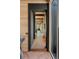 Stunning hallway with light wood walls and floors leading to living space with black piano at 2885 Plow Ground Rd, Johns Island, SC 29455