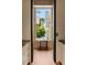 The hallway features custom cabinets and a view of the yard at 2885 Plow Ground Rd, Johns Island, SC 29455