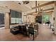 Expansive open-concept living space with modern kitchen, dining area, and fireplace at 2885 Plow Ground Rd, Johns Island, SC 29455