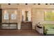 Inviting living room with hardwood floors, stylish furnishings, and elegant artwork at 2885 Plow Ground Rd, Johns Island, SC 29455