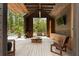 This inviting outdoor space features a covered seating area, modern design, and lush greenery, perfect for relaxing and entertaining at 2885 Plow Ground Rd, Johns Island, SC 29455