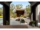 Stunning outdoor living space with custom shed-roof structure and inviting seating area, perfect for entertaining at 2885 Plow Ground Rd, Johns Island, SC 29455