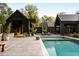 Stunning pool and outdoor lounge area of this modern home, perfect for relaxation and entertaining at 2885 Plow Ground Rd, Johns Island, SC 29455