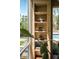 Unique built-in shelf with views to the pool at 2885 Plow Ground Rd, Johns Island, SC 29455