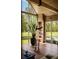 Bright sunroom with large windows and view of the backyard swimming pool at 2885 Plow Ground Rd, Johns Island, SC 29455