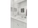 Bathroom featuring a double sink vanity, tiled floors, and large mirror at 2928 Tranquility Rd, Mount Pleasant, SC 29466