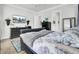 Relaxing bedroom with dark wood furniture, a ceiling fan, and a serene ambiance with a TV for relaxation at 2928 Tranquility Rd, Mount Pleasant, SC 29466