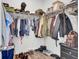 Walk-in closet featuring ample storage with hanging rods and shelving, perfect for organizing clothes and shoes at 2928 Tranquility Rd, Mount Pleasant, SC 29466
