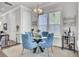 Cozy dining area with stylish light fixture, elegant seating, and natural light at 2928 Tranquility Rd, Mount Pleasant, SC 29466