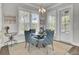 Cozy dining area with stylish light fixture, elegant seating, and natural light at 2928 Tranquility Rd, Mount Pleasant, SC 29466
