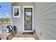 Inviting front porch with comfortable seating, ideal for relaxing and enjoying the outdoors at 2928 Tranquility Rd, Mount Pleasant, SC 29466