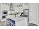Well-equipped kitchen features a central island with seating and modern stainless steel appliances at 2928 Tranquility Rd, Mount Pleasant, SC 29466